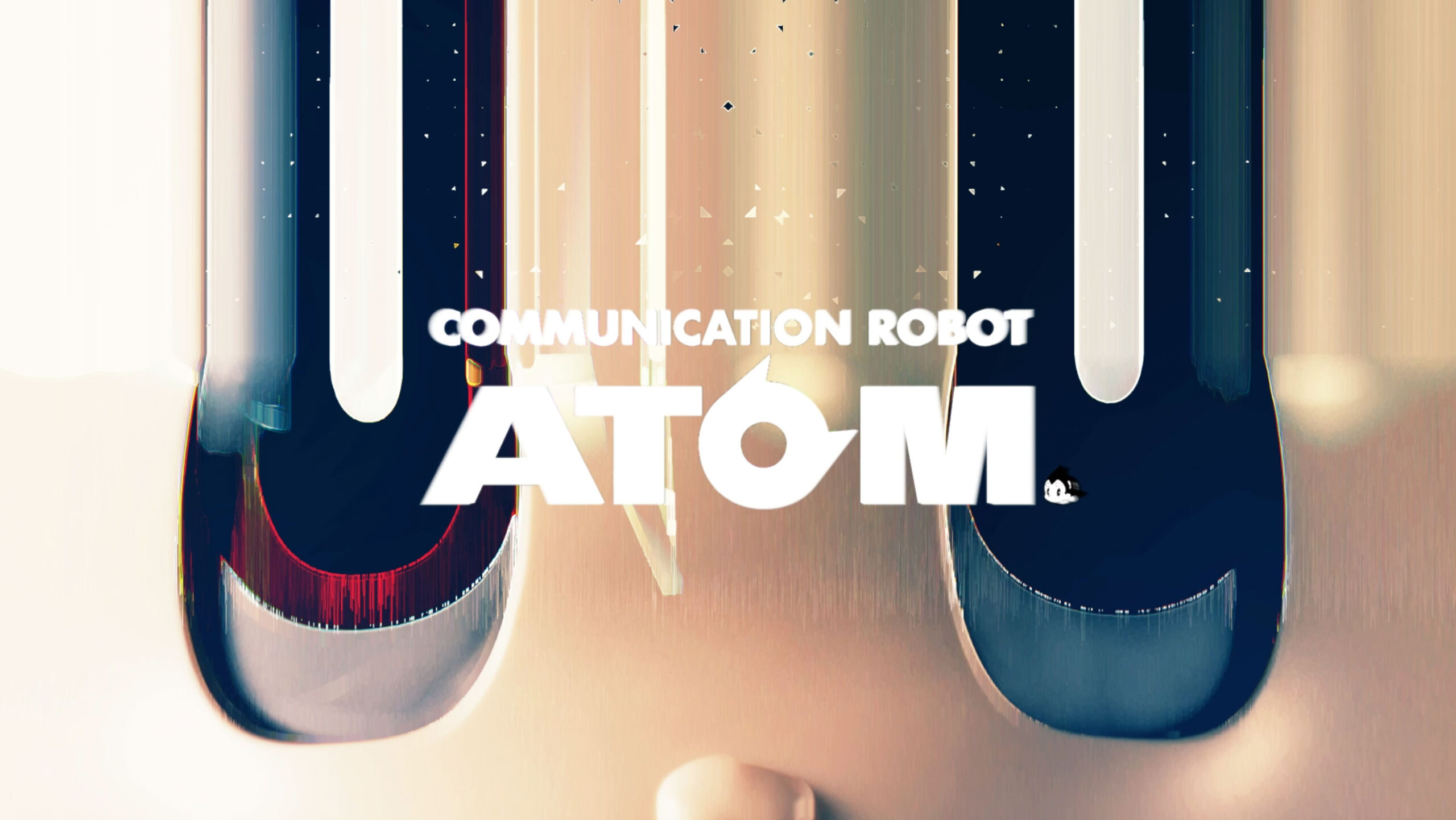 コミュニケーションロボットATOMのプロモーションムービーサムネイル　鉄腕アトムの実物ロボットの目とATOMロゴが大きく写っています